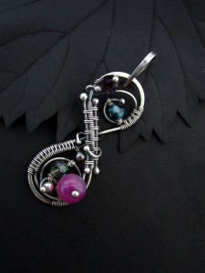 Zeloutis Wearable Art - Wire wrapped sterling silver and fine silver wearable art jewelry featuring semi-precious gemstones and artisan glass.