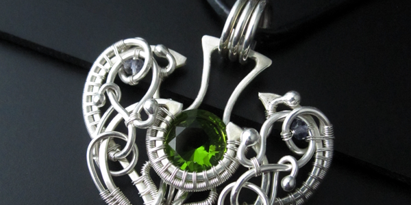 Sterling silver spade pendant with peridot
