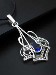 Zeloutis Fine Art Jewelry - Uncommon wire wrapped sterling and fine silver wearable fine art jewelry featuring semi-precious gemstones and artisan glass.