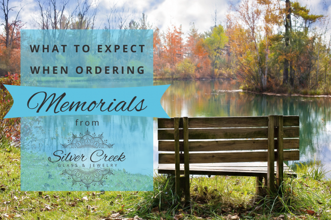 Picture of an empty wood bench by a pond with text that reads "what to expect when ordering memorials from Silver Creek Glass & Jewelry