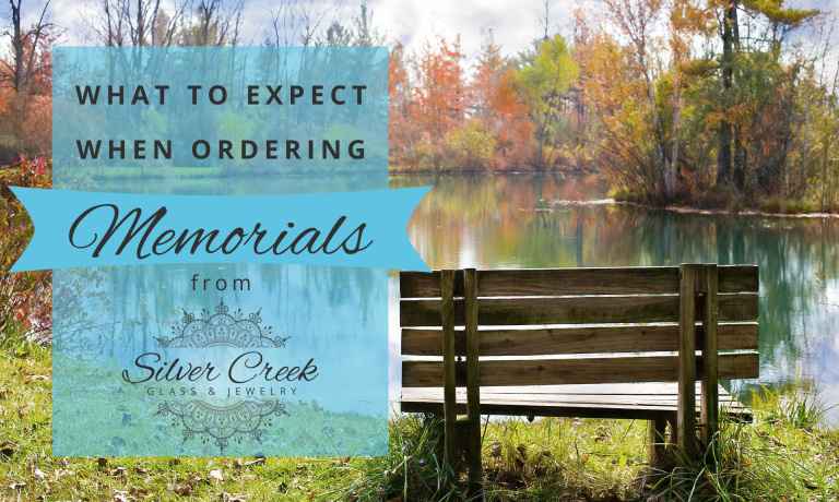 Picture of an empty wood bench by a pond with text that reads "what to expect when ordering memorials from Silver Creek Glass & Jewelry