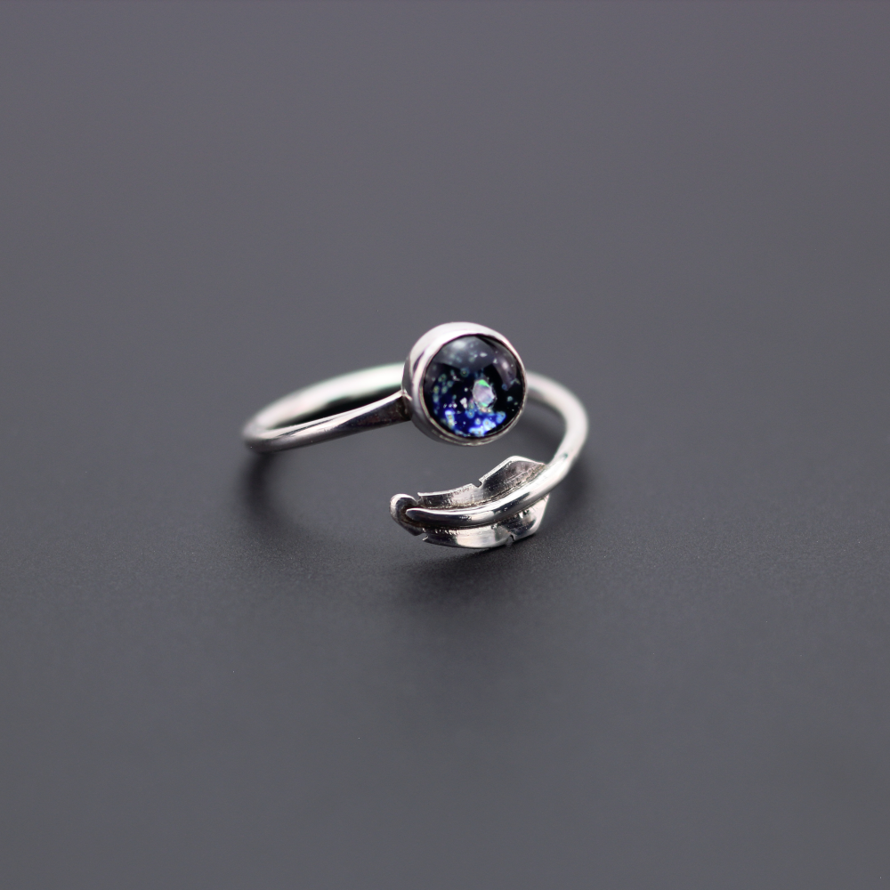 image of a silver memorial feather adjustable ring