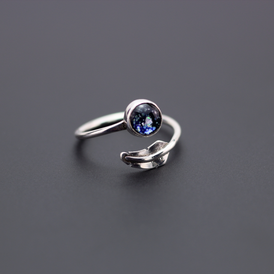 image of a silver memorial feather adjustable ring